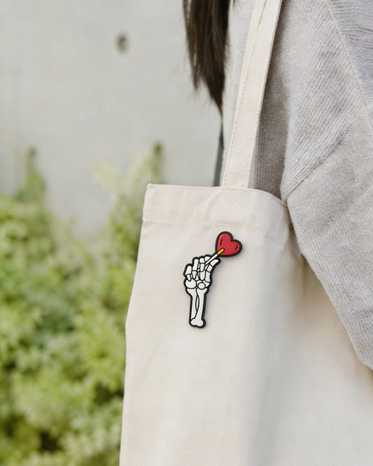 Enamel Pin - Skeleton Hand, Heart Lollipop